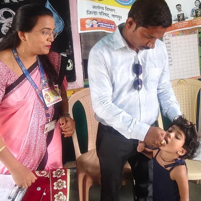Pulse Polio vaccination camp with health department banner in Nagpur